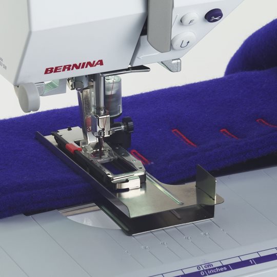 Устройство Bernina для улучшения перемещения ткани для выполнения петель